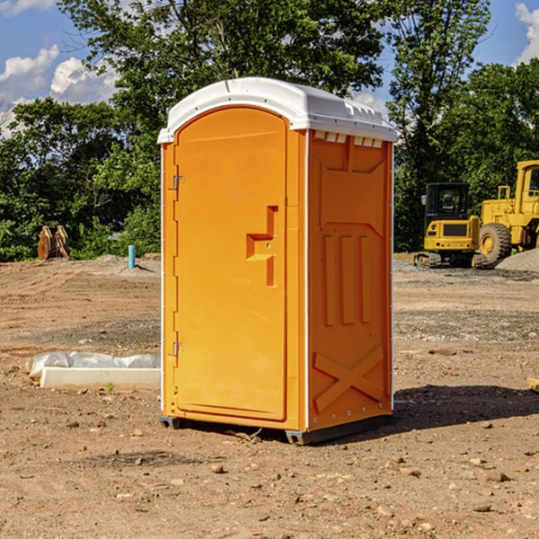 what is the cost difference between standard and deluxe portable restroom rentals in Jackson County Kansas